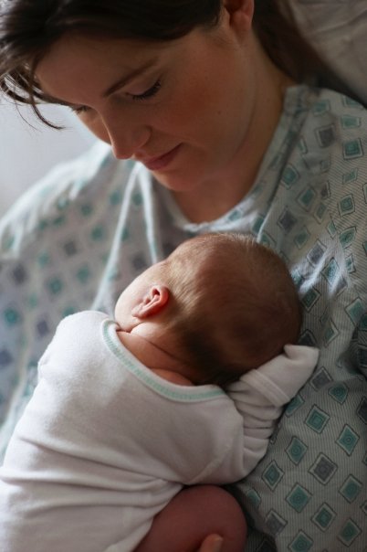 image of mother with first baby at hospital