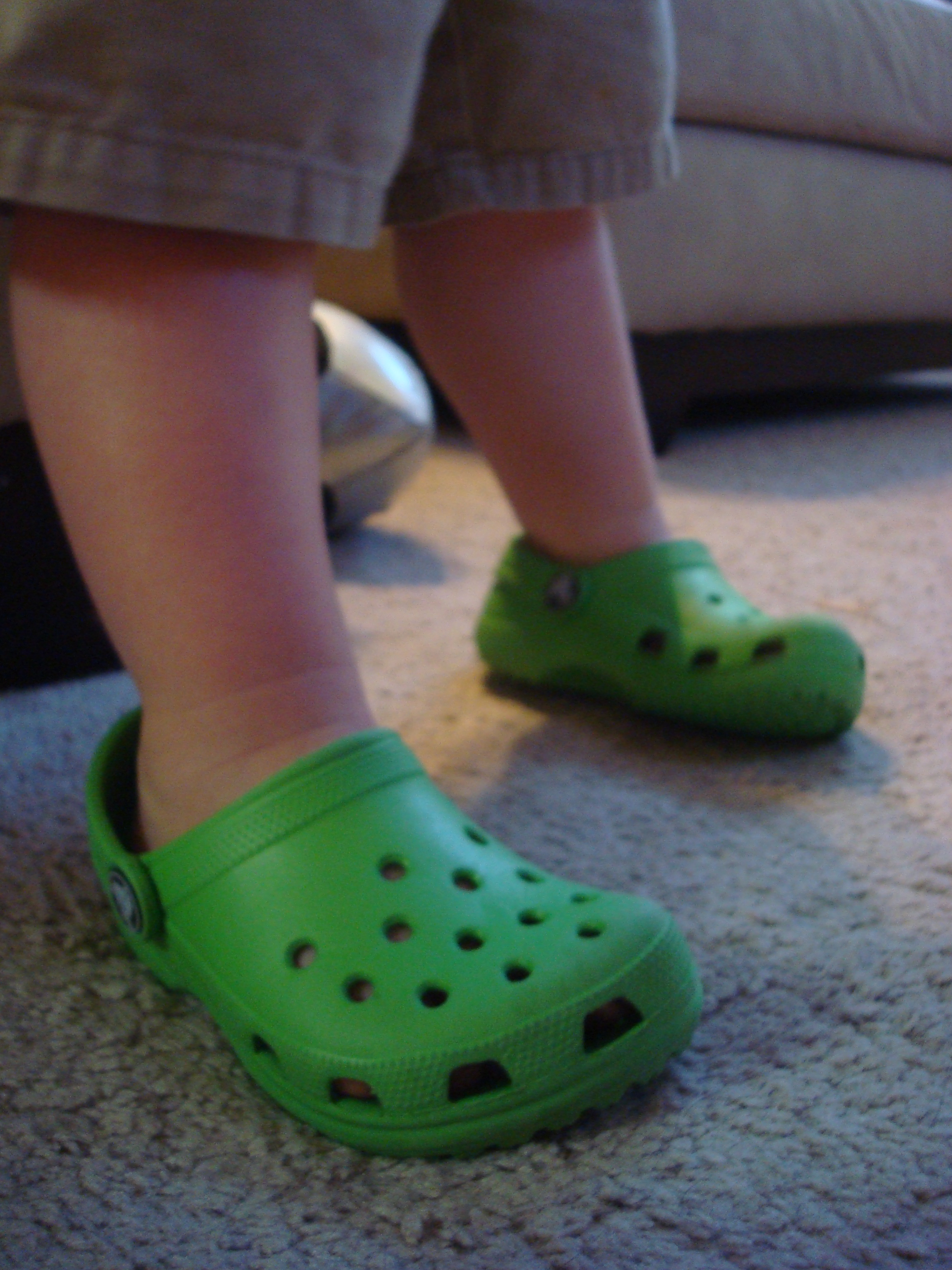 crocs with feet in them