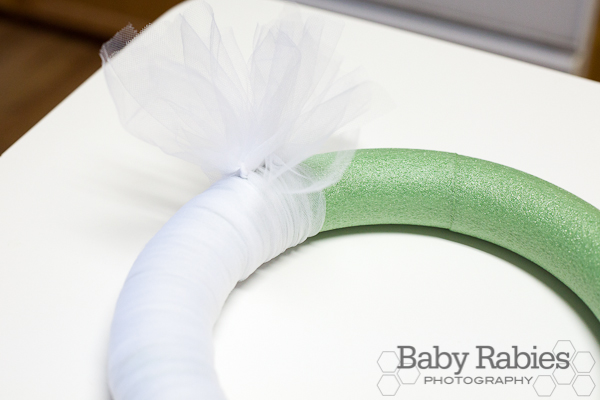image of wreath foam ring with a quarter finished tulle strips