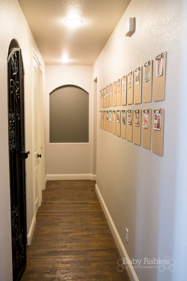 Low cost, big impact way to display life's little moments- DIY clipboard gallery wall! | BabyRabies.com