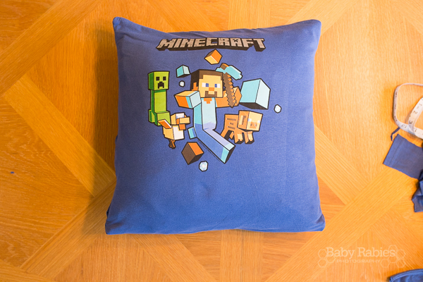Upcycle old t-shirts into room decor, including wall hangings AND a crazy easy video tutorial for a t-shirt pillow cover | BabyRabies.com